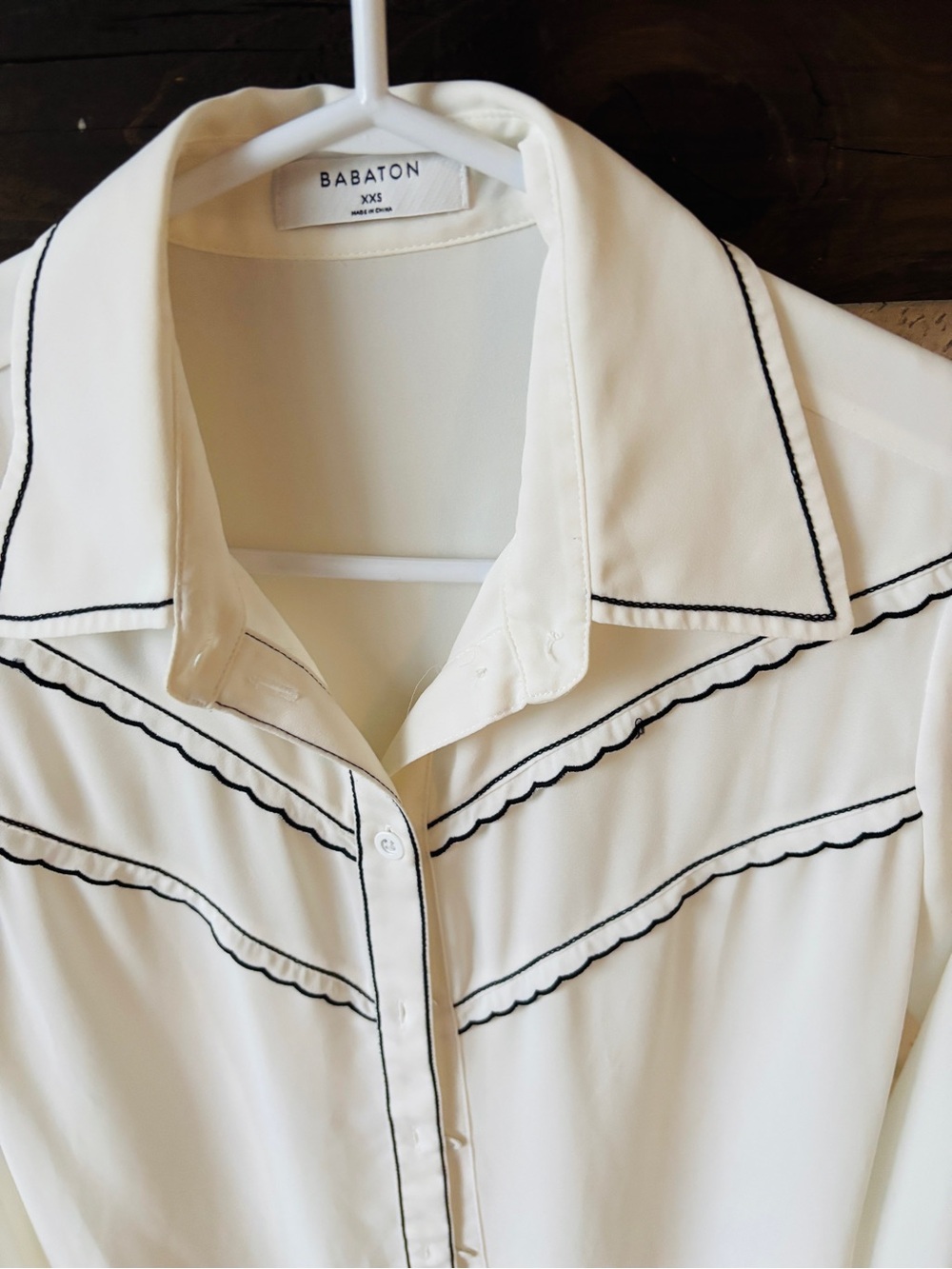 Babaton Cream Button-Down blouse with Black Contrast Stitching